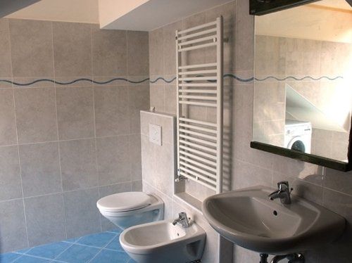 Archisio - Renova - Progetto Bagni