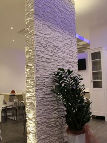 Archisio - Giuseppe Strippoli - Progetto Pizzeria rosticceria la tradizione