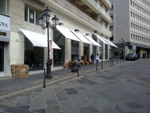 Archisio - Errico Gaglianese - Progetto Realizzazione punti vendita benetton e sisley di catanzaro