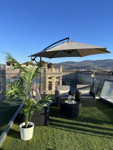 Archisio - Zoe Home Studio - Progetto Allestimento terrazzo in piazza castello