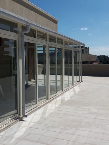 Archisio - Showroom di Officina Metalmeccanica Antonio Mizzi Del Geom Mizzi Leonardo - Infissi in anticorodal a giunto apertotaglio termico legno alluminio pvc verande termiche e blindate protezioni in ferro persiane fisse e regolabili tapparelle in pvc alluminio e acciaio zanz