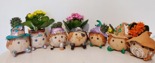 Archisio - Lavoro di Frisart - Realizzazione di vasi e oggetti artistici in terracotta