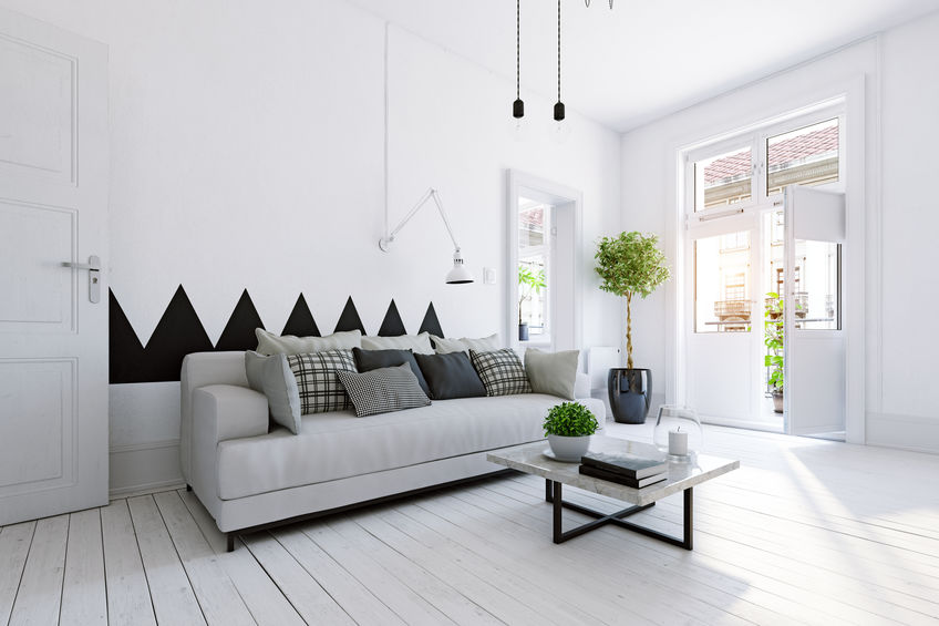 Living: ampliare il soggiorno con divani a parete