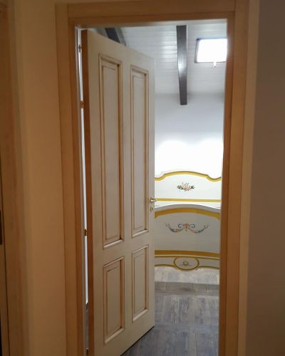 Archisio - Falegnameria Tuccitto - Progetto Porte in legno