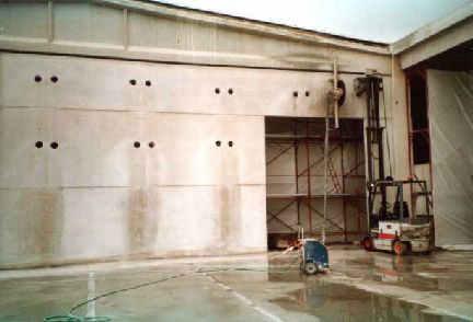 Archisio - Demolizione Controllata Cardone - Progetto Carotaggio per passaggio di tubature e taglio su pannelli prefabbricati con asportazione intera parete