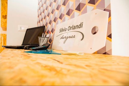 Archisio - Silvia Orlandi - Progetto Punto vendita elettronica e servizi