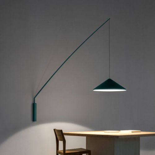 Archisio - Paola Illuminazione - Progetto La bellezza di un illuminazione da parete per un tavolo